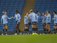 Khadija Shaw #21 of Manchester City W.F.C celebrates her goal with teammates during the Barclays FA Women's Super League match between Manch...