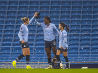 Khadija Shaw #21 of Manchester City W.F.C celebrates her goal with teammates during the Barclays FA Women's Super League match between Manch...