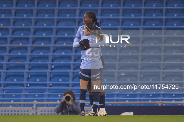 Khadija Shaw #21 of Manchester City W.F.C celebrates her goal with teammates during the Barclays FA Women's Super League match between Manch...