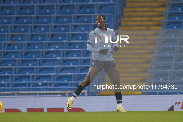 Khadija Shaw #21 of Manchester City W.F.C. celebrates her goal during the Barclays FA Women's Super League match between Manchester City and...