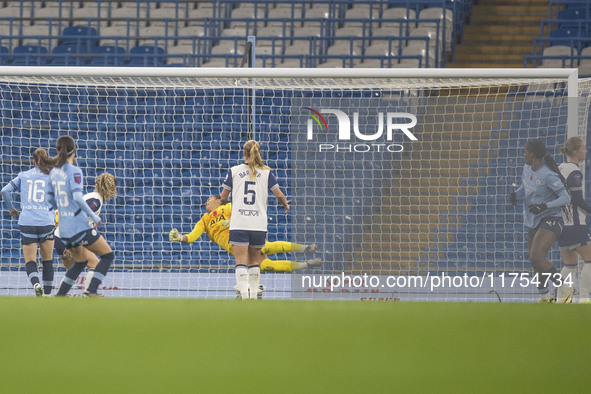 Khadija Shaw #21 of Manchester City W.F.C. scores a goal to make it 2-0 during the Barclays FA Women's Super League match between Manchester...