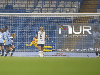 Khadija Shaw #21 of Manchester City W.F.C. scores a goal to make it 2-0 during the Barclays FA Women's Super League match between Manchester...