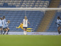 Khadija Shaw #21 of Manchester City W.F.C. scores a goal to make it 2-0 during the Barclays FA Women's Super League match between Manchester...