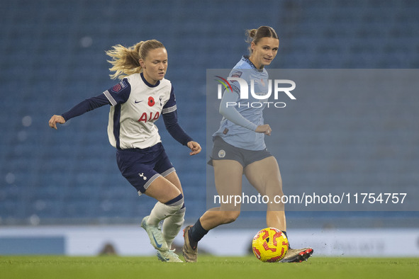 Kerstin Casparij #18 of Manchester City W.F.C. is in possession of the ball during the Barclays FA Women's Super League match between Manche...