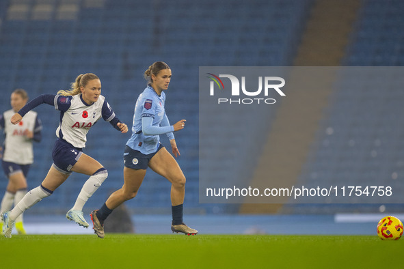 Kerstin Casparij #18 of Manchester City W.F.C. is in possession of the ball during the Barclays FA Women's Super League match between Manche...