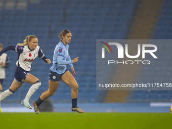 Kerstin Casparij #18 of Manchester City W.F.C. is in possession of the ball during the Barclays FA Women's Super League match between Manche...