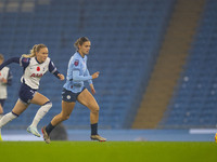 Kerstin Casparij #18 of Manchester City W.F.C. is in possession of the ball during the Barclays FA Women's Super League match between Manche...