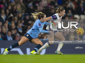 Lauren Hemp #11 of Manchester City W.F.C. challenges the opponent during the Barclays FA Women's Super League match between Manchester City...