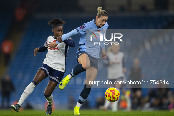 Alanna Kennedy #14 of Manchester City W.F.C. is in possession of the ball during the Barclays FA Women's Super League match between Manchest...