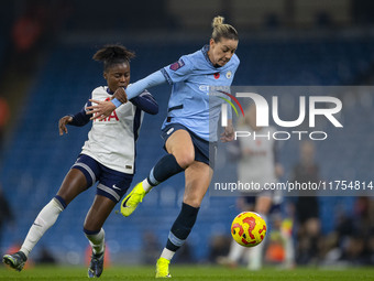 Alanna Kennedy #14 of Manchester City W.F.C. is in possession of the ball during the Barclays FA Women's Super League match between Manchest...