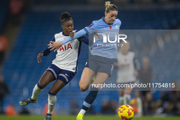 Alanna Kennedy #14 of Manchester City W.F.C. is in possession of the ball during the Barclays FA Women's Super League match between Manchest...