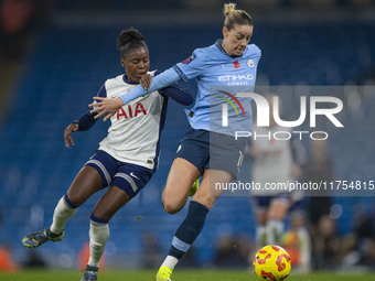 Alanna Kennedy #14 of Manchester City W.F.C. is in possession of the ball during the Barclays FA Women's Super League match between Manchest...