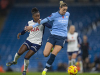 Alanna Kennedy #14 of Manchester City W.F.C. is in possession of the ball during the Barclays FA Women's Super League match between Manchest...