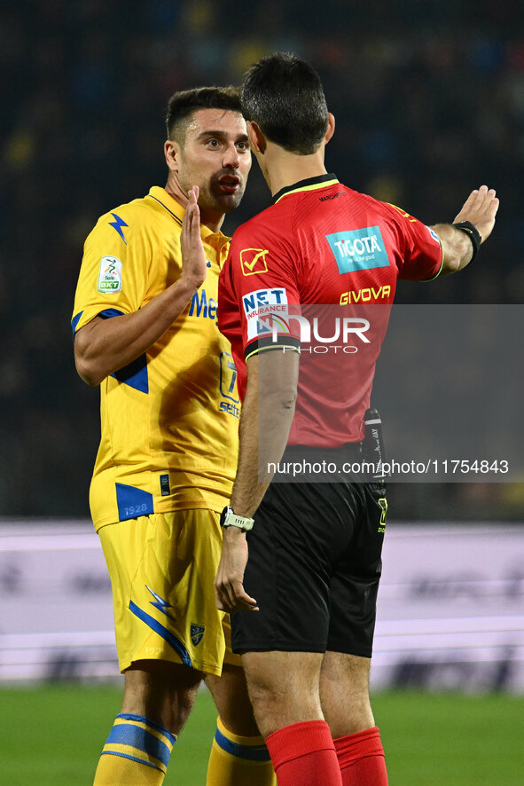 Riccardo Marchizza of Frosinone Calcio and Referee Matteo Marchetti are present during the 13th day of the Serie BKT Championship between Fr...