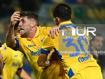 Gabriele Bracaglia of Frosinone Calcio celebrates after scoring the goal to make it 1-1 during the 13th day of the Serie BKT Championship be...