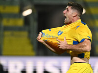 Gabriele Bracaglia of Frosinone Calcio celebrates after scoring the goal to make it 1-1 during the 13th day of the Serie BKT Championship be...