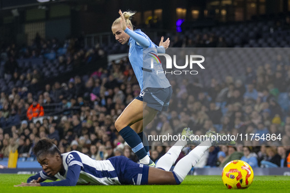 Alex Greenwood #5 of Manchester City W.F.C. fouls the opponent during the Barclays FA Women's Super League match between Manchester City and...