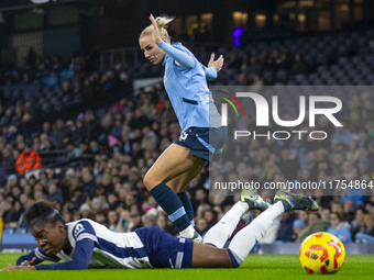 Alex Greenwood #5 of Manchester City W.F.C. fouls the opponent during the Barclays FA Women's Super League match between Manchester City and...