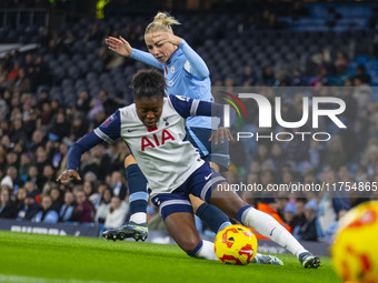 Alex Greenwood #5 of Manchester City W.F.C. fouls the opponent during the Barclays FA Women's Super League match between Manchester City and...