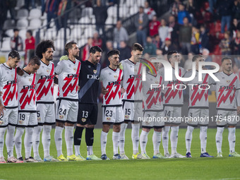 The Rayo Vallecano team observes a minute of silence in memory of the victims of the Valencian floods during the La Liga EA Sports 2024/25 f...