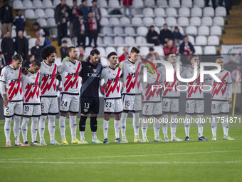 The Rayo Vallecano team observes a minute of silence in memory of the victims of the Valencian floods during the La Liga EA Sports 2024/25 f...