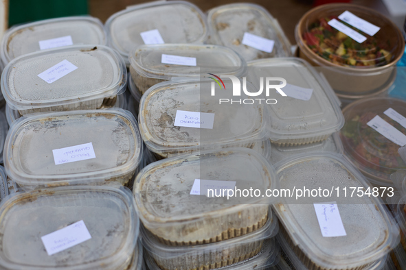 Volunteers deliver food in Benetusser, Spain, on november 08, 2024, due to the flood 