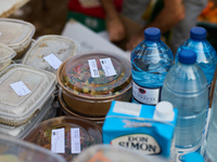 Volunteers deliver food in Benetusser, Spain, on november 08, 2024, due to the flood (