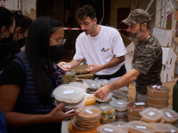 Volunteers deliver food in Benetusser, Spain, on november 08, 2024, due to the flood (