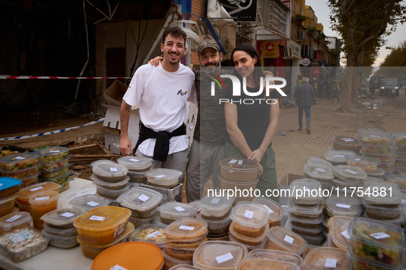 Volunteers deliver food in Benetusser, Spain, on november 08, 2024, due to the flood 