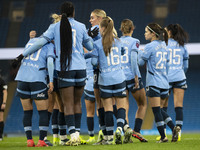 Jill Roord #10 of Manchester City W.F.C. celebrates her goal with teammates during the Barclays FA Women's Super League match between Manche...