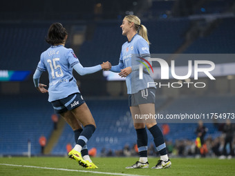 Jill Roord #10 of Manchester City W.F.C. celebrates her goal with teammates during the Barclays FA Women's Super League match between Manche...