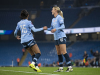 Jill Roord #10 of Manchester City W.F.C. celebrates her goal with teammates during the Barclays FA Women's Super League match between Manche...