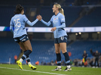 Jill Roord #10 of Manchester City W.F.C. celebrates her goal with teammates during the Barclays FA Women's Super League match between Manche...