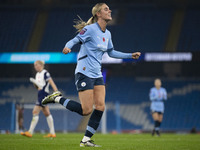 Jill Roord #10 of Manchester City W.F.C. celebrates her goal during the Barclays FA Women's Super League match between Manchester City and T...