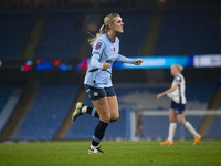 Jill Roord #10 of Manchester City W.F.C. celebrates her goal during the Barclays FA Women's Super League match between Manchester City and T...