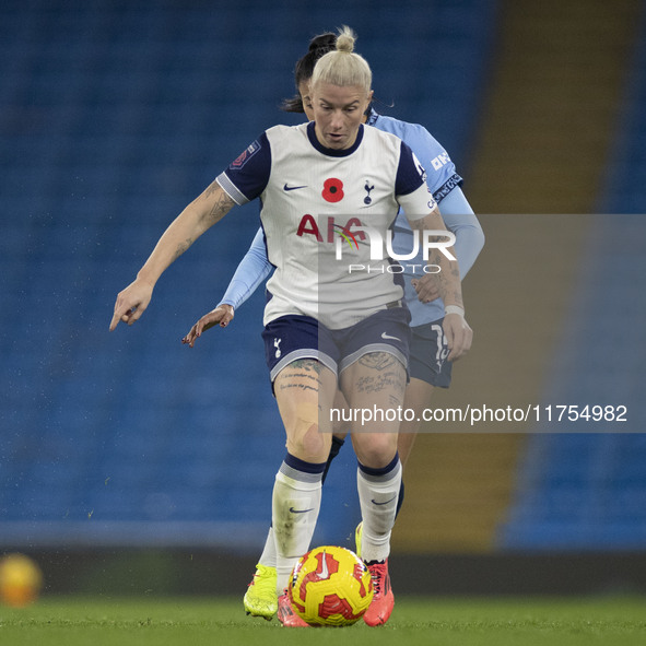 Beth England, number 9 of Tottenham Hotspur F.C., participates in the Barclays FA Women's Super League match between Manchester City and Tot...