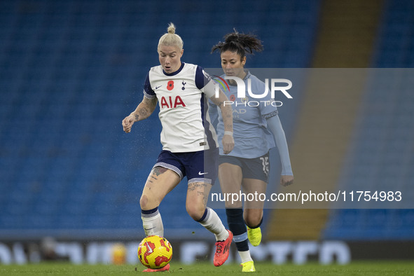 Beth England #9 of Tottenham Hotspur F.C. is in possession of the ball during the Barclays FA Women's Super League match between Manchester...