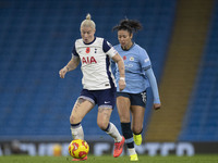 Beth England #9 of Tottenham Hotspur F.C. is in possession of the ball during the Barclays FA Women's Super League match between Manchester...