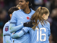 Khadija Shaw #21 of Manchester City W.F.C. celebrates her goal during the Barclays FA Women's Super League match between Manchester City and...