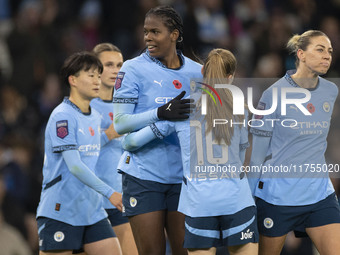 Khadija Shaw #21 of Manchester City W.F.C. celebrates her goal during the Barclays FA Women's Super League match between Manchester City and...