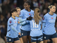 Khadija Shaw #21 of Manchester City W.F.C. celebrates her goal during the Barclays FA Women's Super League match between Manchester City and...