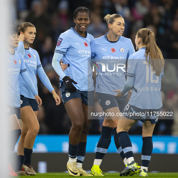 Khadija Shaw #21 of Manchester City W.F.C. celebrates her goal during the Barclays FA Women's Super League match between Manchester City and...