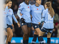 Khadija Shaw #21 of Manchester City W.F.C. celebrates her goal during the Barclays FA Women's Super League match between Manchester City and...