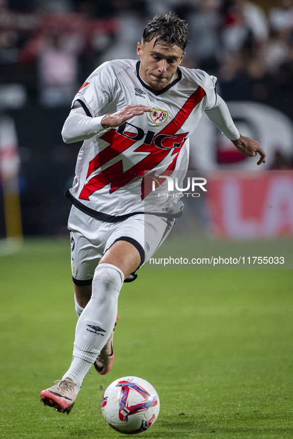 Andrei Ratiu of Rayo Vallecano is in action with the ball during the La Liga EA Sports 2024/25 football match between Rayo Vallecano and UD...