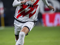 Andrei Ratiu of Rayo Vallecano is in action with the ball during the La Liga EA Sports 2024/25 football match between Rayo Vallecano and UD...