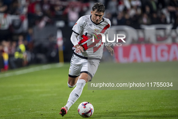 Andrei Ratiu of Rayo Vallecano is in action with the ball during the La Liga EA Sports 2024/25 football match between Rayo Vallecano and UD...