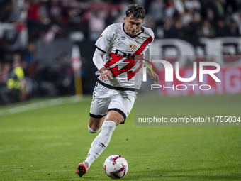 Andrei Ratiu of Rayo Vallecano is in action with the ball during the La Liga EA Sports 2024/25 football match between Rayo Vallecano and UD...