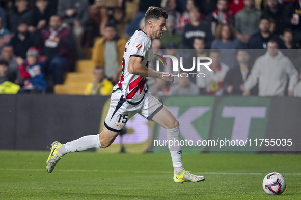 Gerard Gumbau of Rayo Vallecano is in action with the ball during the La Liga EA Sports 2024/25 football match between Rayo Vallecano and UD...