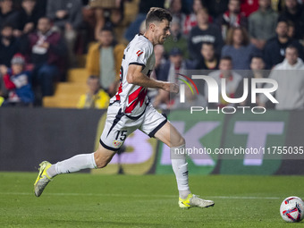 Gerard Gumbau of Rayo Vallecano is in action with the ball during the La Liga EA Sports 2024/25 football match between Rayo Vallecano and UD...