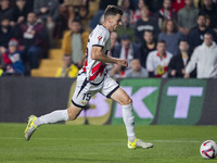 Gerard Gumbau of Rayo Vallecano is in action with the ball during the La Liga EA Sports 2024/25 football match between Rayo Vallecano and UD...